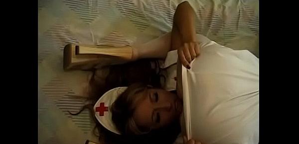  A pair of horny lesbian nurses lick each other sensually